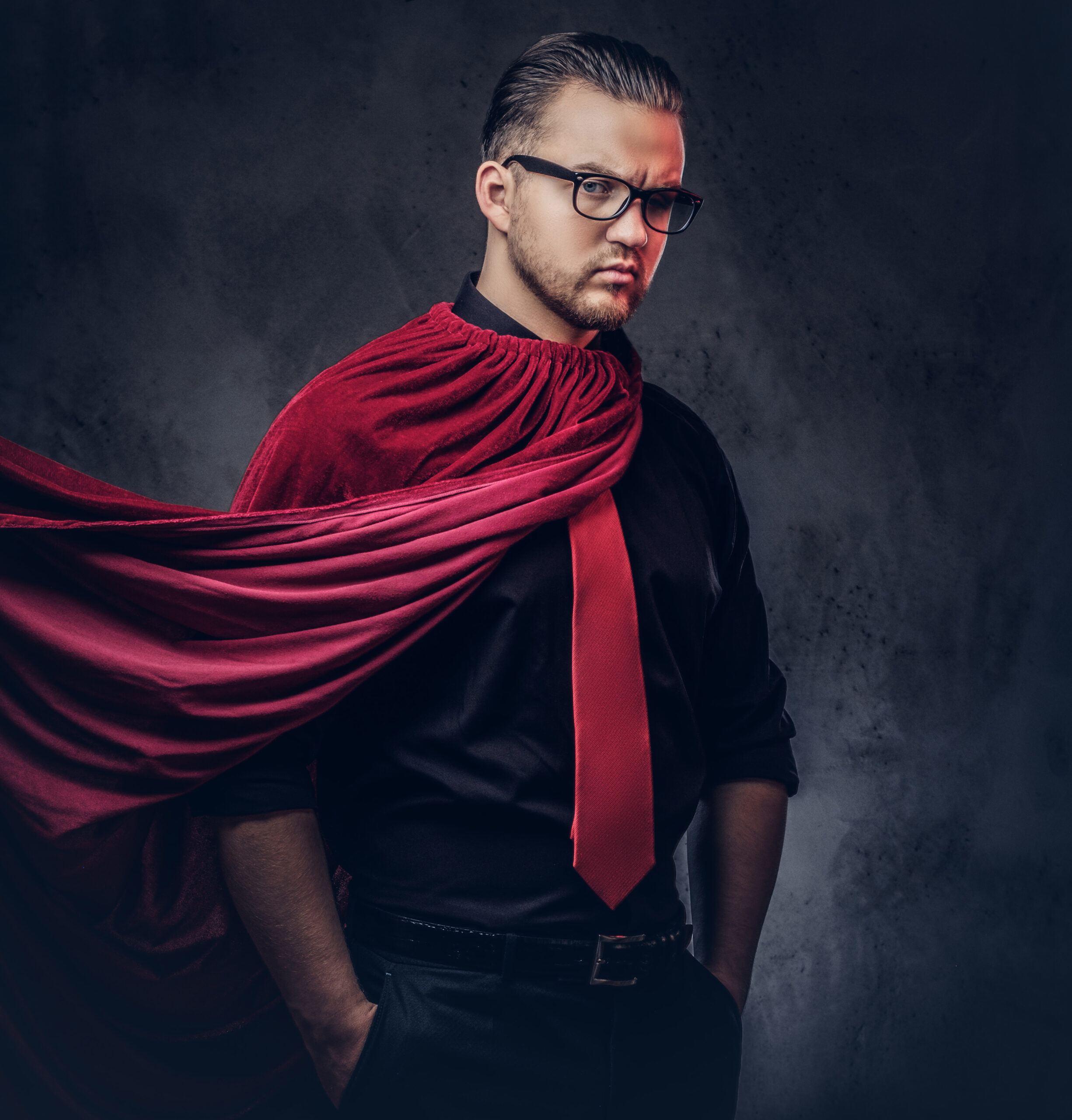 Stock photo of man with Red Tie and Black Shirt with Glasses. Stock photo of man with Red Tie and Black Shirt.